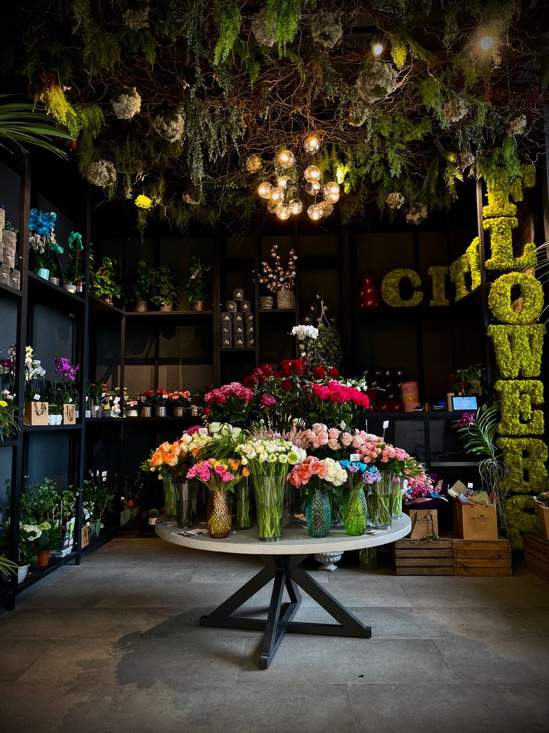 flower shop business for sale - colorful floral display in storefront