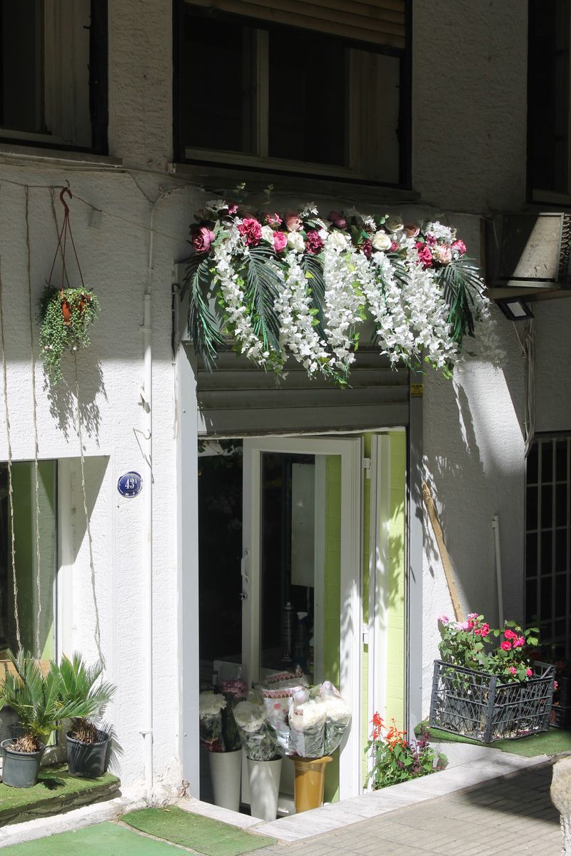 flower shop business for sale - fresh flower buckets in retail store