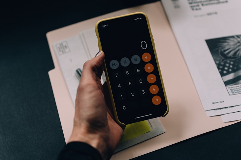 Financial Planning Business for Sale: Complete Buyer's Guide 1 Financial planning business for sale - financial documents and calculator review